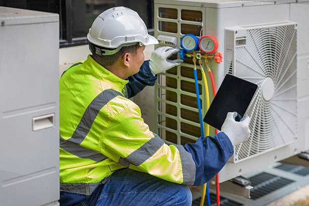 Professional Heat Pump Repair technician working in Macon, IL